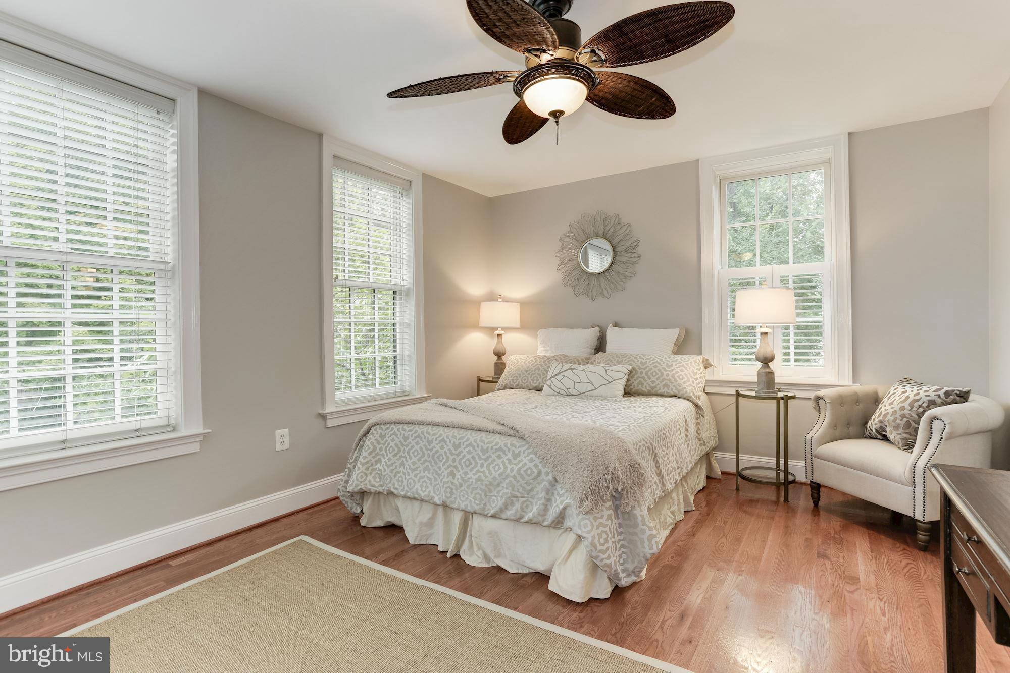 3318 Volta Place Northwest, Unit 2 Washington, DC 20007 - Photo 21 of 30 a bedroom with a large bed and a large window