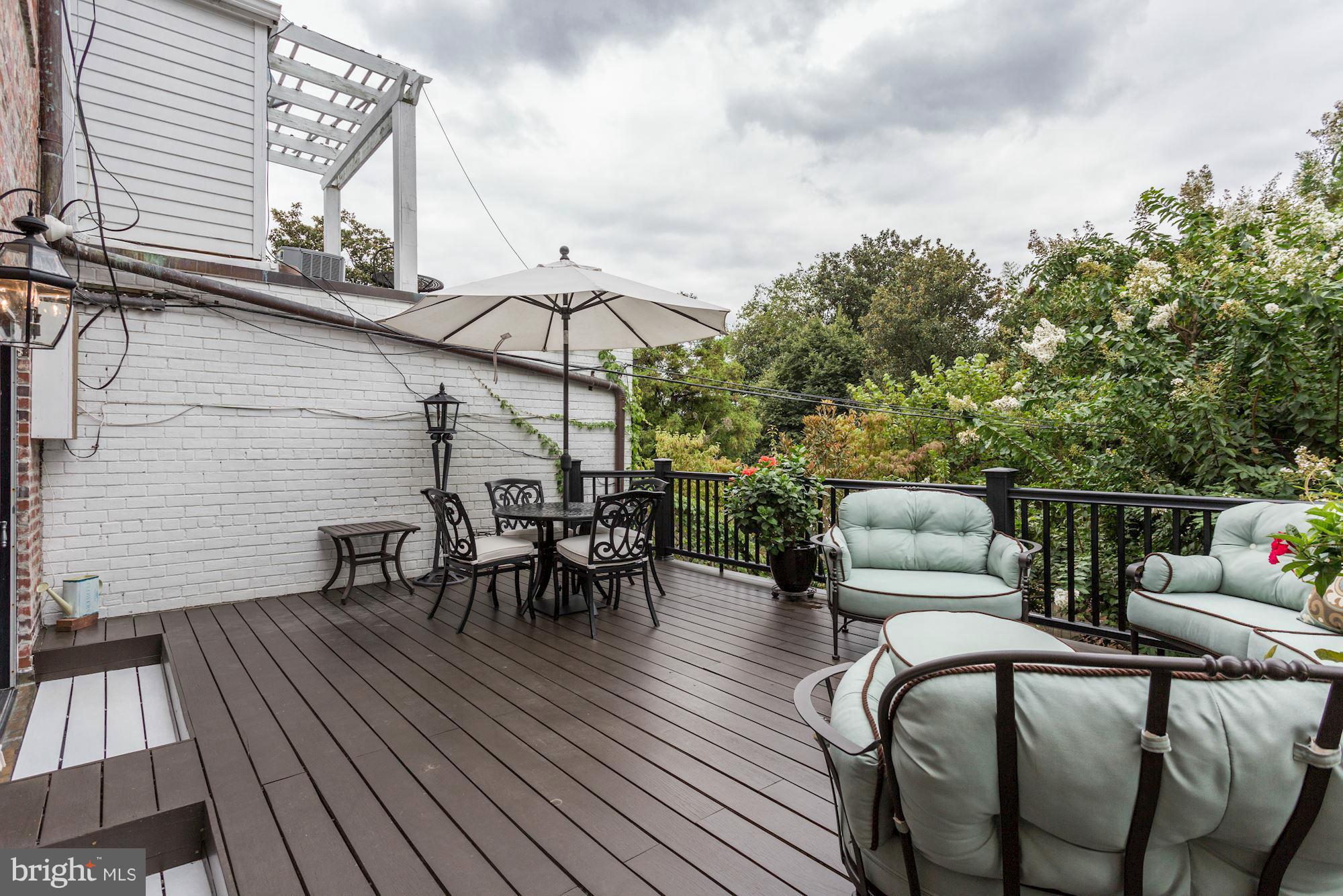 3318 Volta Place Northwest, Unit 2 Washington, DC 20007 - Photo 27 of 30 swimming pool view with a seating space