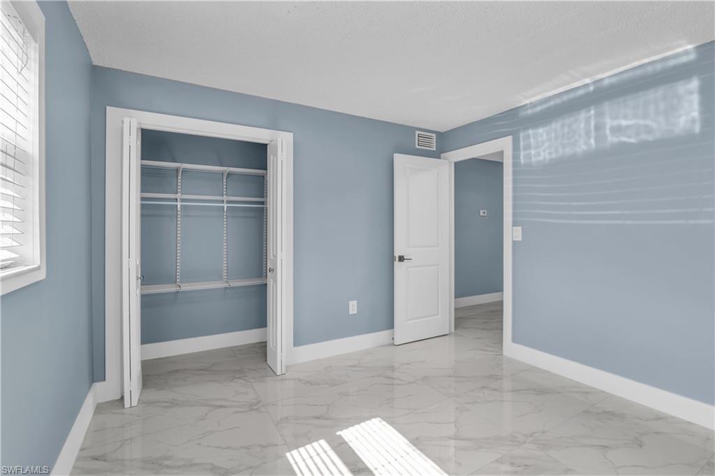 3325 Airport Road North, Unit T1 Naples, FL 34105 - Photo 11 of 19 a view of an empty room