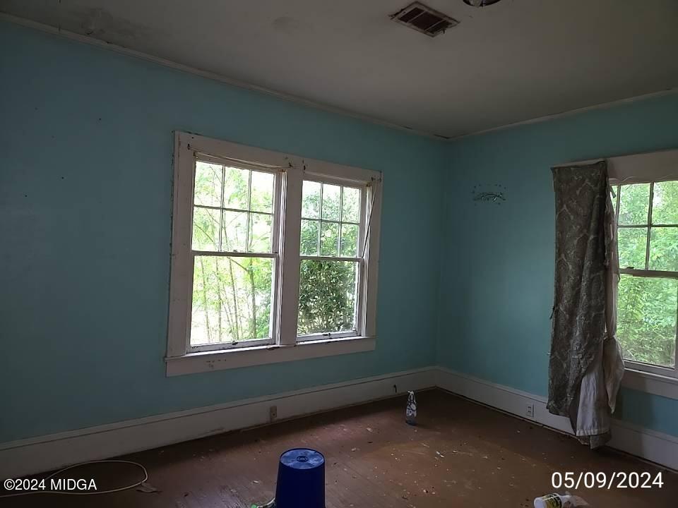 1627 Upper River Road Macon, GA 31211 - Photo 15 of 23 an empty room with a window