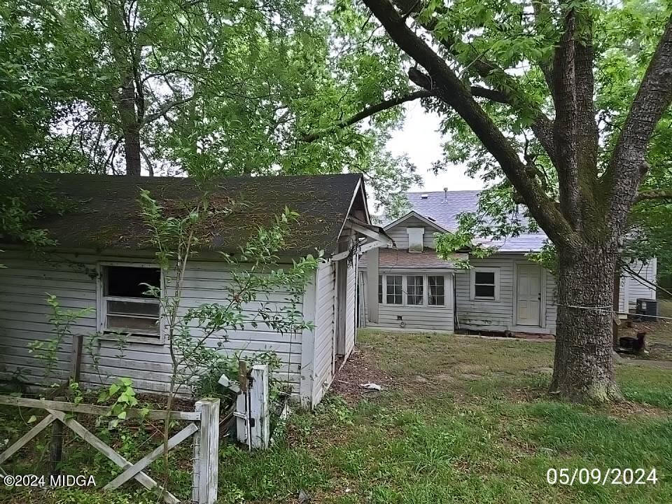 1627 Upper River Road Macon, GA 31211 - Photo 2 of 23 front view of house with a yard