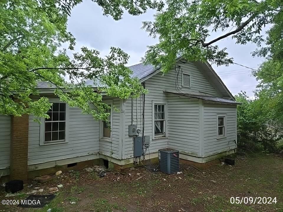 1627 Upper River Road Macon, GA 31211 - Photo 5 of 23 a view of a small house with a tree