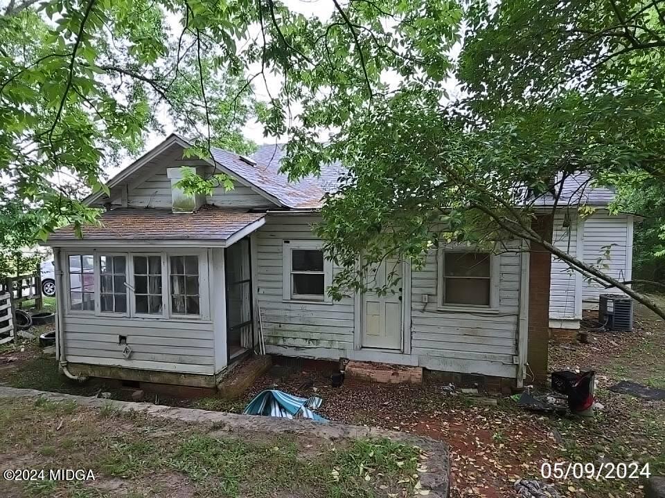 1627 Upper River Road Macon, GA 31211 - Photo 6 of 23 a view of a house with a yard