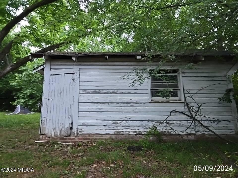 1627 Upper River Road Macon, GA 31211 - Photo 7 of 23 a backyard of a house