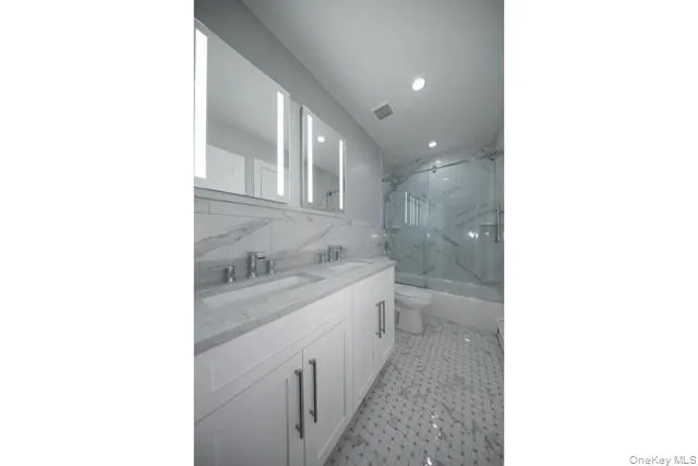 a bathroom with a sink and a bathtub