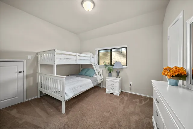 a room with a bed and a table