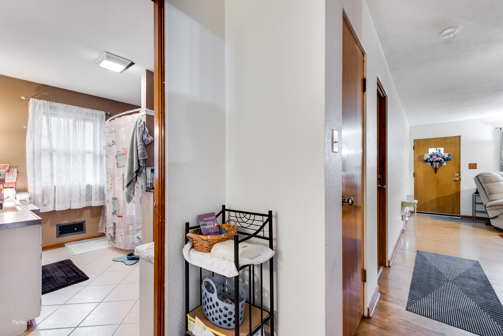 210 South Reed Street Joliet, IL 60436 - Photo 9 of 13 a view of a hallway with workspace and a window