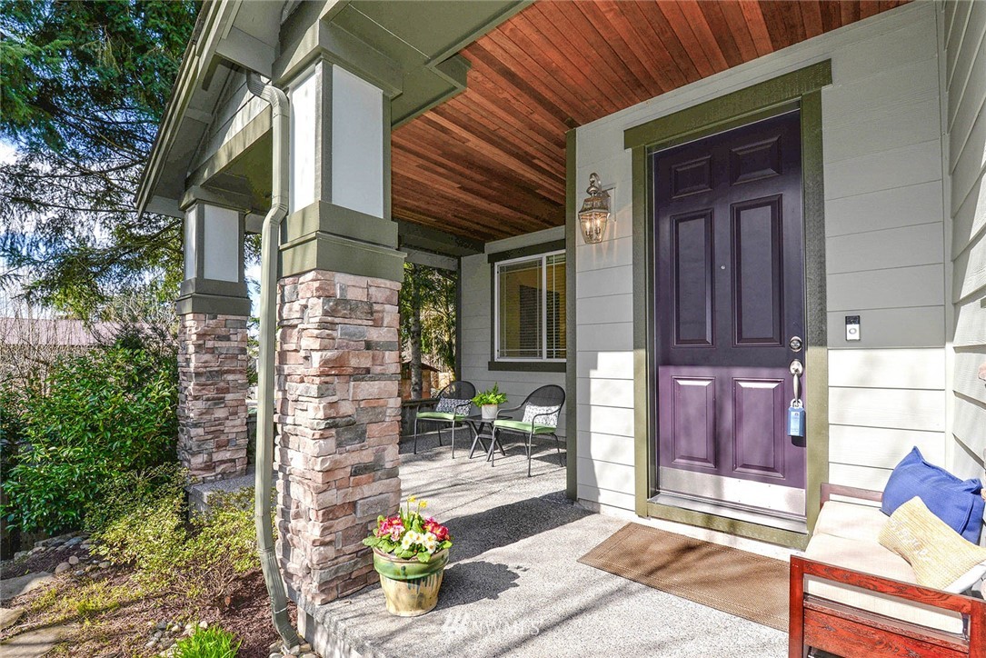 21814 41st Avenue Southeast Bothell, WA 98021 - Photo 2 of 30 a front view of a house with a porch