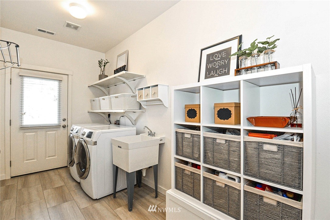 21814 41st Avenue Southeast Bothell, WA 98021 - Photo 16 of 30 a utility room with dryer and washer