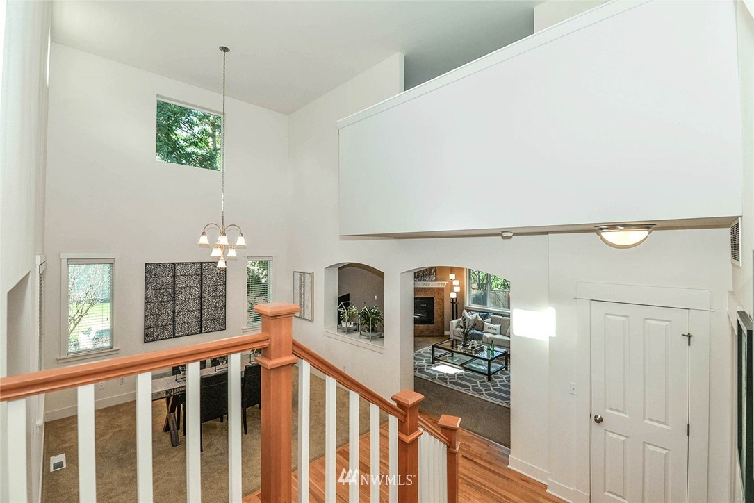 21814 41st Avenue Southeast Bothell, WA 98021 - Photo 18 of 30 a view of a hallway with windows