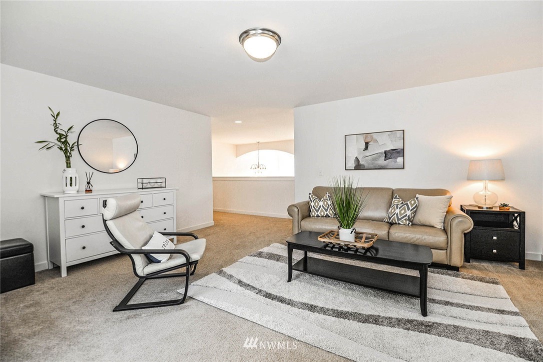 21814 41st Avenue Southeast Bothell, WA 98021 - Photo 25 of 30 a living room with furniture