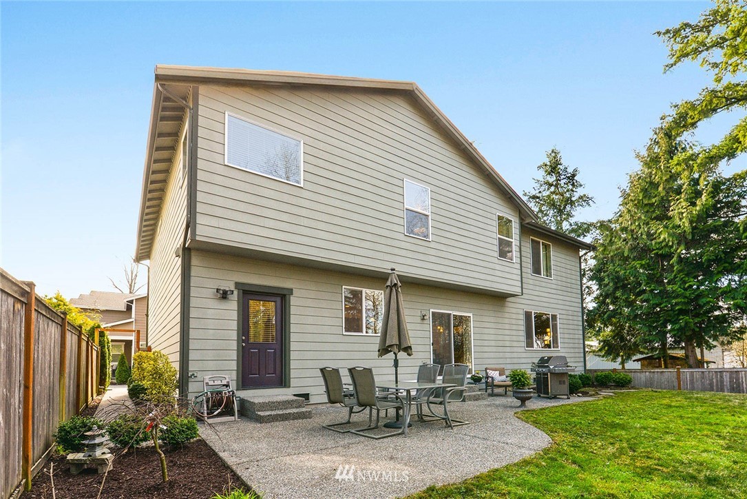 21814 41st Avenue Southeast Bothell, WA 98021 - Photo 29 of 30 a front view of house with yard and outdoor seating