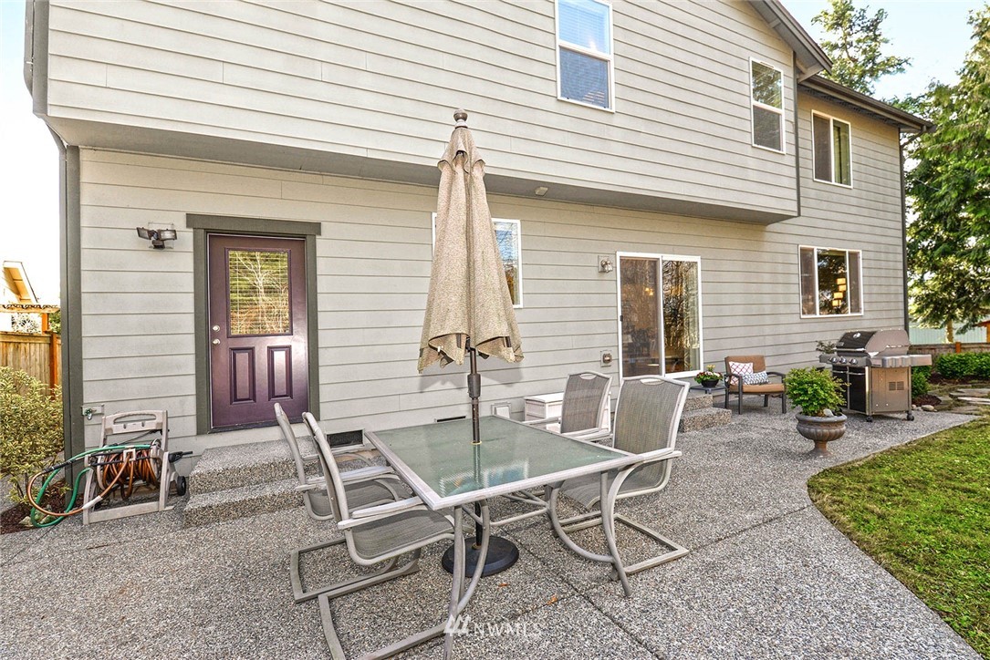 21814 41st Avenue Southeast Bothell, WA 98021 - Photo 30 of 30 a view of a outdoor seating area with furniture