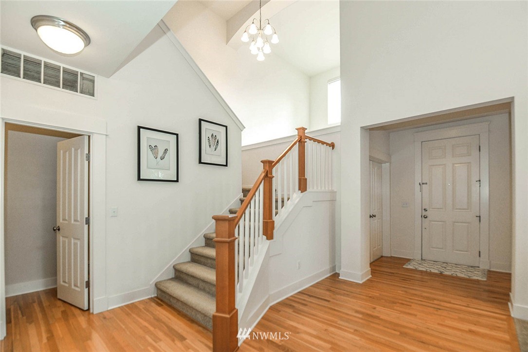 21814 41st Avenue Southeast Bothell, WA 98021 - Photo 5 of 30 a view of entryway with wooden floor and stairs