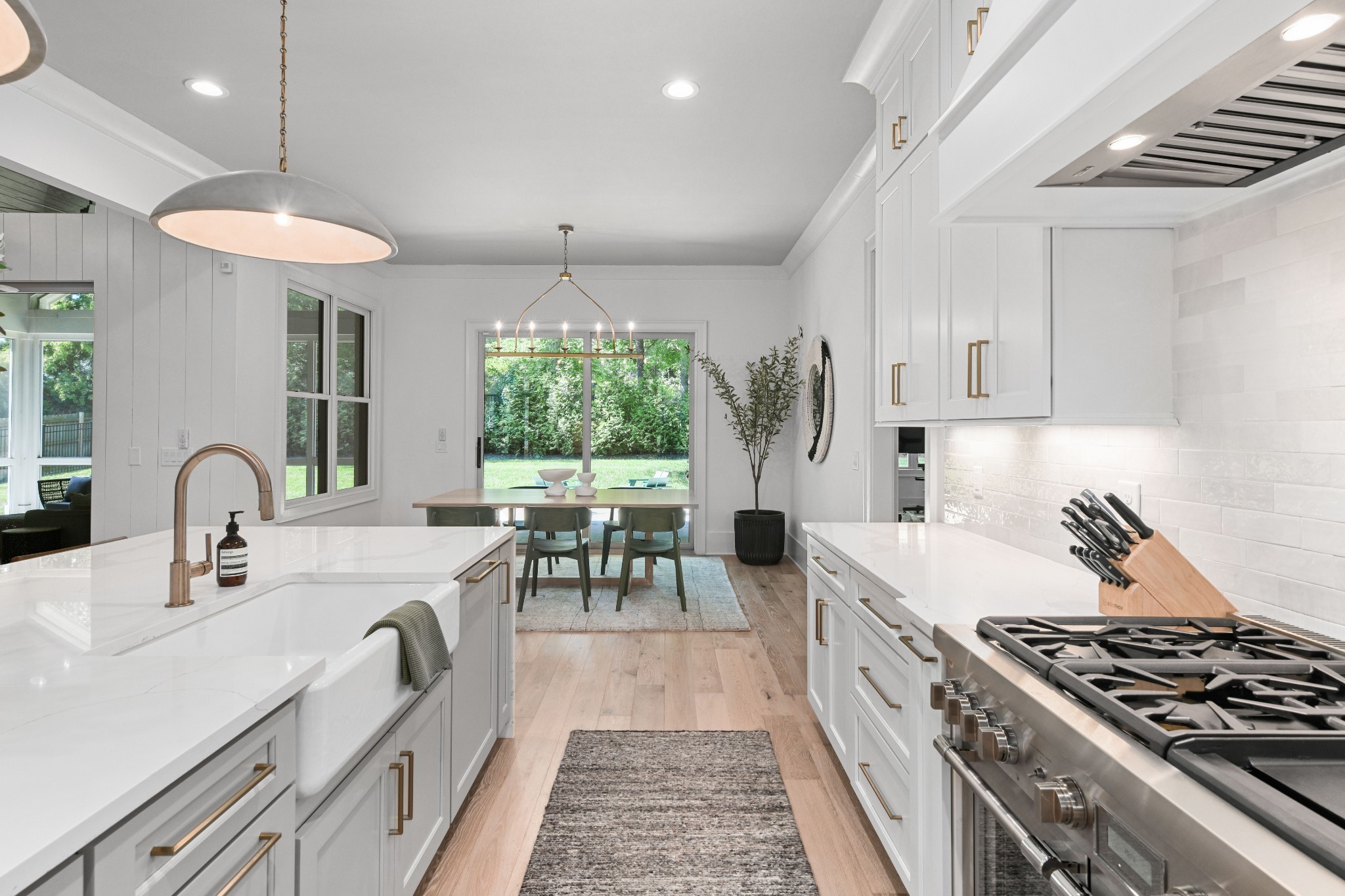 2847 Sugar Tree Road Nashville, TN 37215 - Photo 17 of 52 a kitchen with a stove a refrigerator and a sink