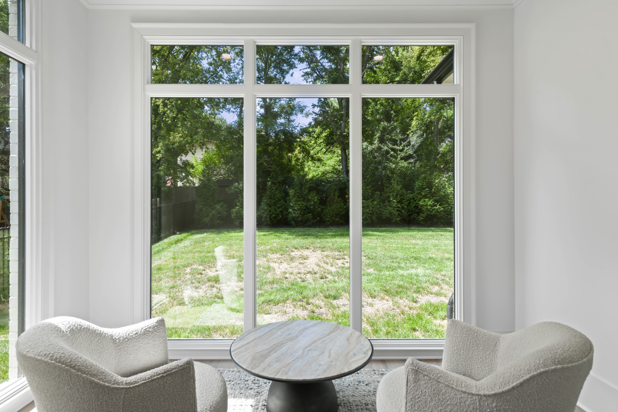 2847 Sugar Tree Road Nashville, TN 37215 - Photo 23 of 52 a view of a living room and floor to ceiling window
