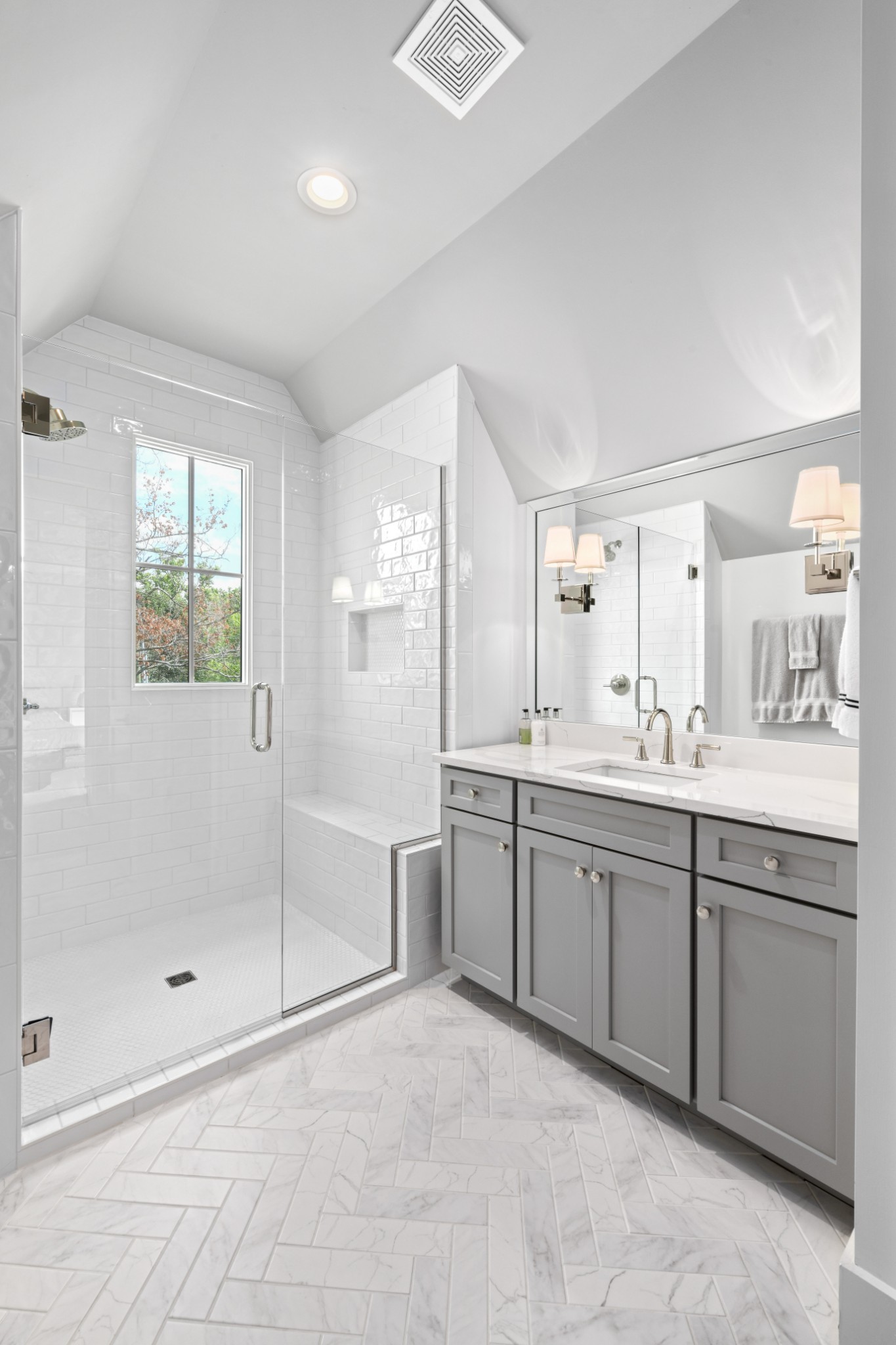 2847 Sugar Tree Road Nashville, TN 37215 - Photo 41 of 52 a spacious bathroom with a shower sink and mirror