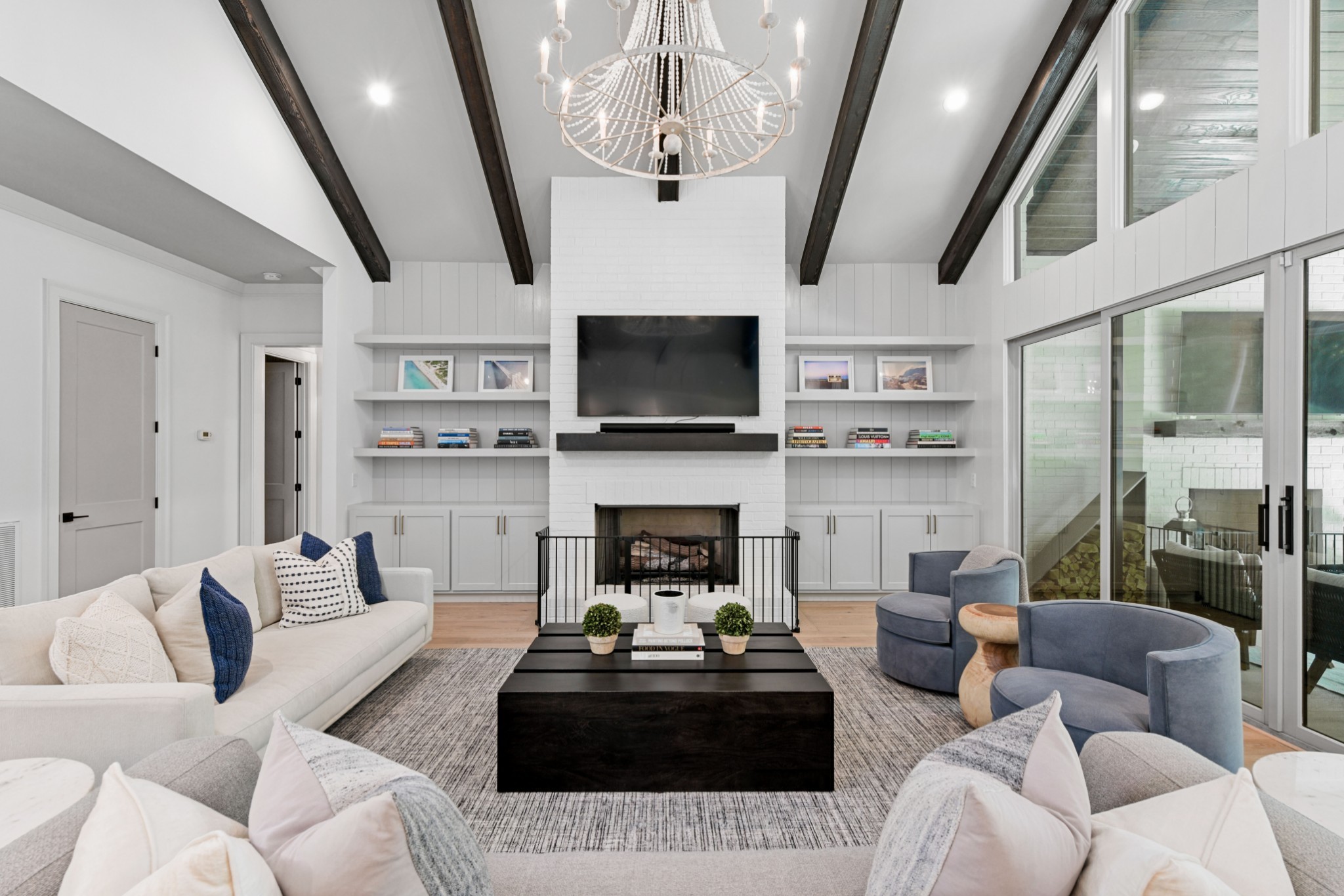 2847 Sugar Tree Road Nashville, TN 37215 - Photo 10 of 52 a living room with furniture a fireplace and a flat screen tv
