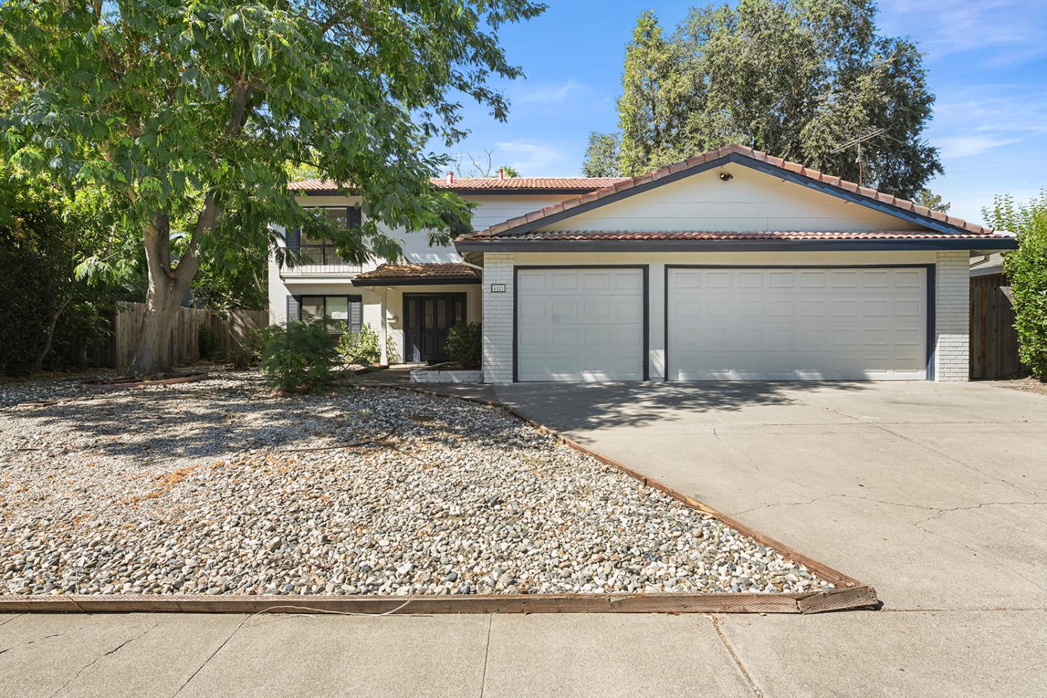 4121 Vista Way Davis, CA 95618 - Photo 1 of 32 front view of a house with a yard
