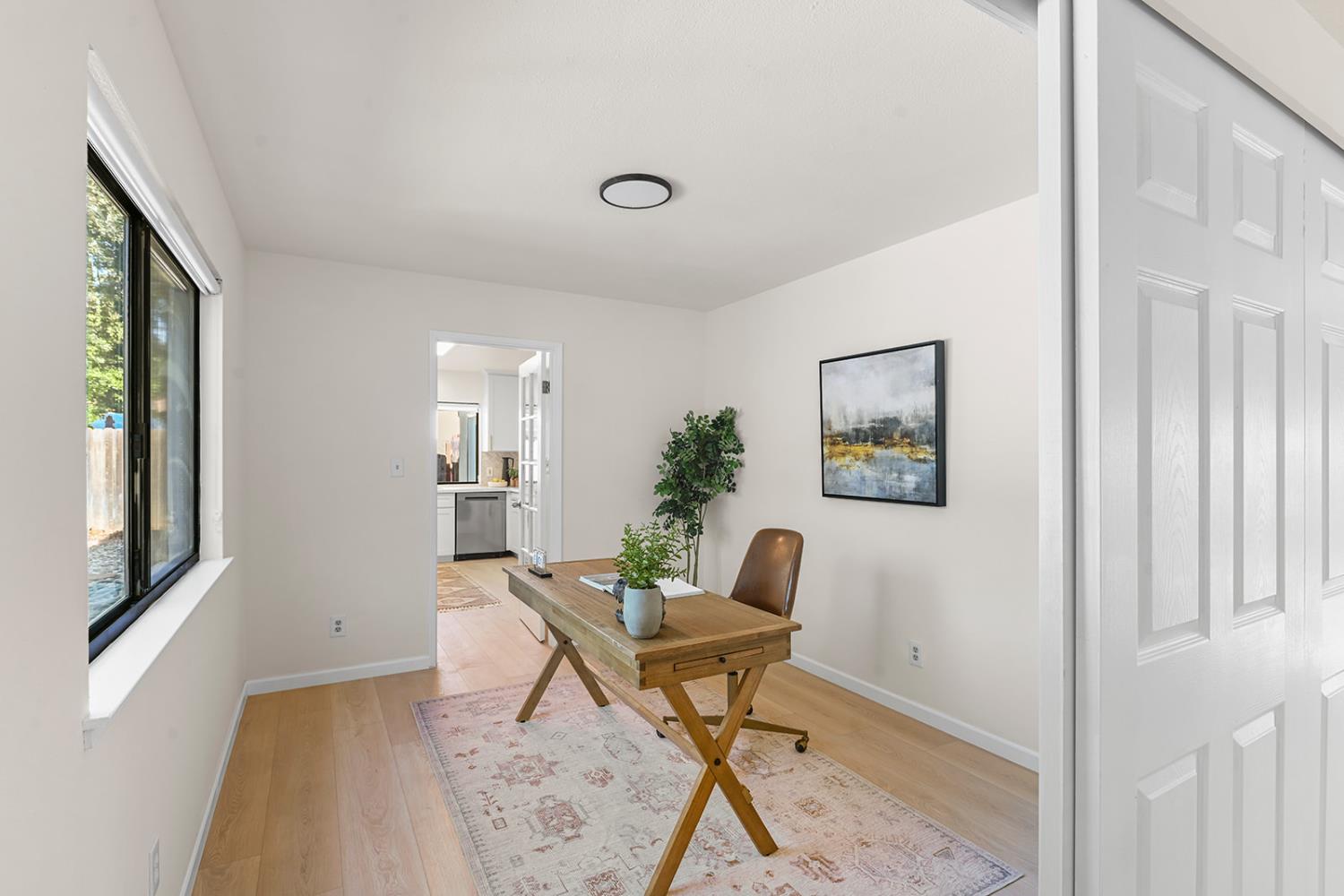 4121 Vista Way Davis, CA 95618 - Photo 11 of 32 a workspace with furniture and a window