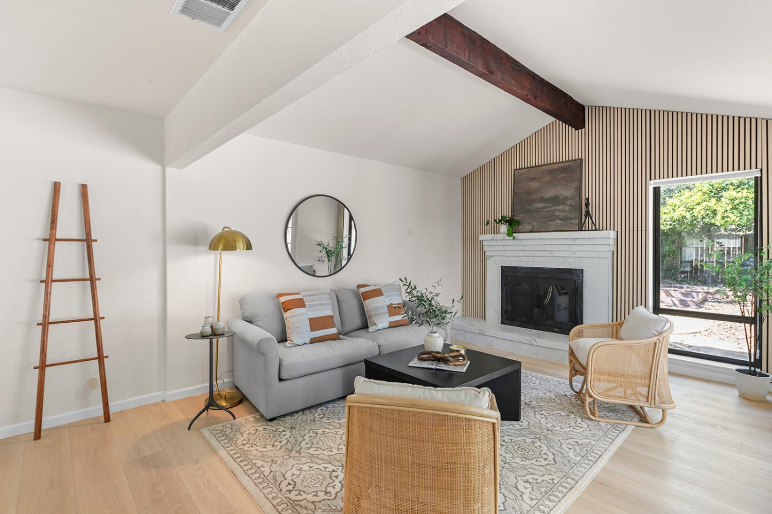 4121 Vista Way Davis, CA 95618 - Photo 14 of 32 a living room with furniture a rug and a fireplace