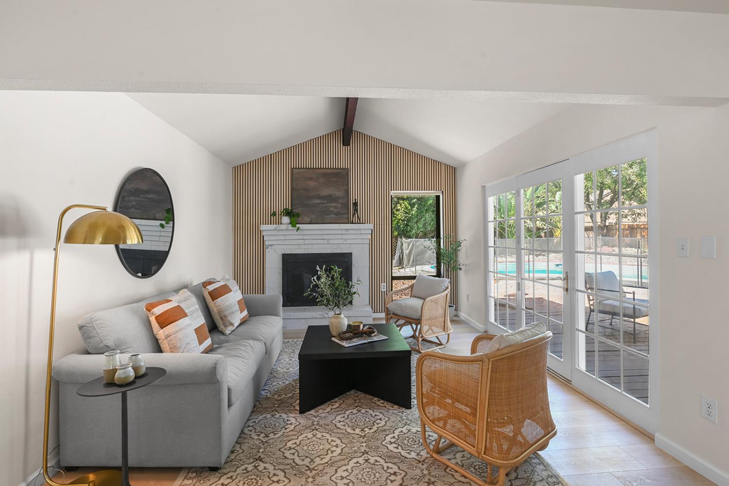 4121 Vista Way Davis, CA 95618 - Photo 15 of 32 a living room with furniture and a fireplace