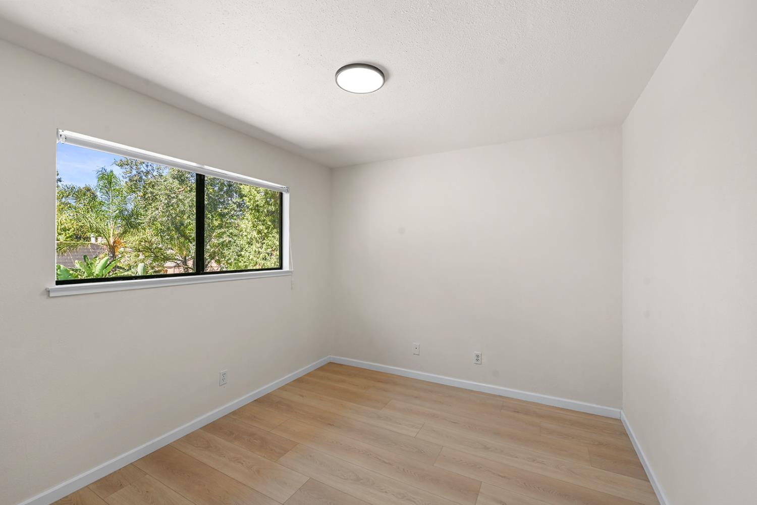 4121 Vista Way Davis, CA 95618 - Photo 17 of 32 an empty room with a window