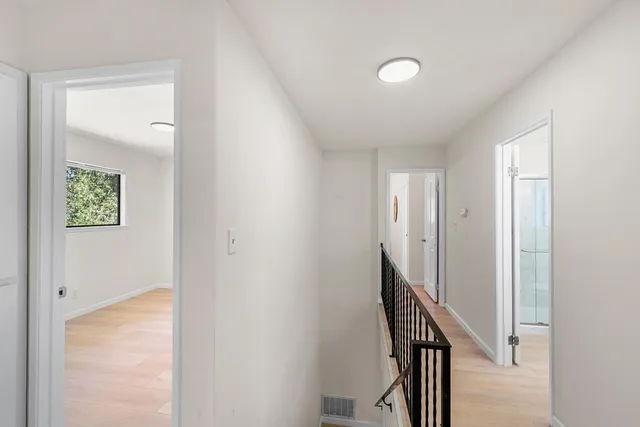 a view of a hallway with entryway