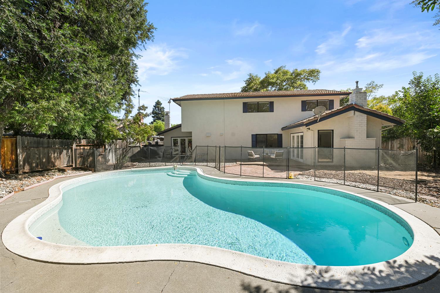 4121 Vista Way Davis, CA 95618 - Photo 30 of 32 a view of a house with pool fire pit and chairs