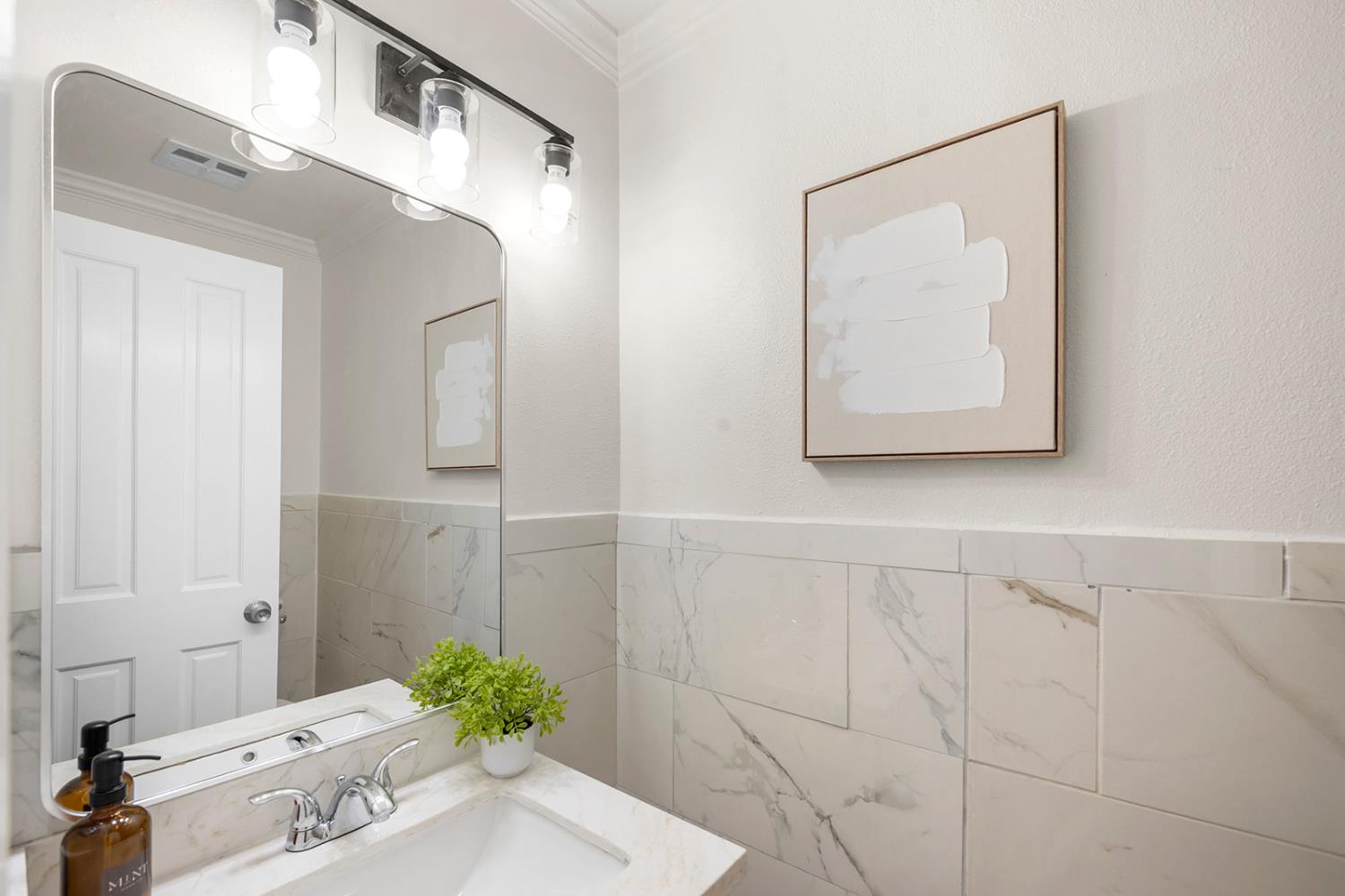4121 Vista Way Davis, CA 95618 - Photo 4 of 32 a bathroom with a sink and a mirror