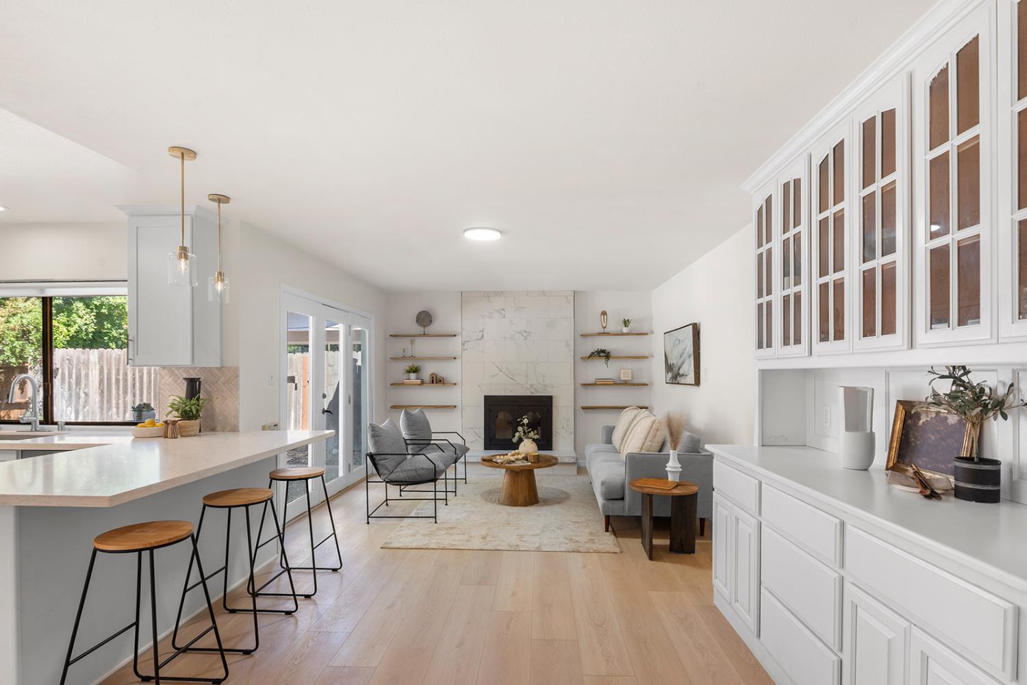 4121 Vista Way Davis, CA 95618 - Photo 5 of 32 a living room with furniture a fireplace and next to a window
