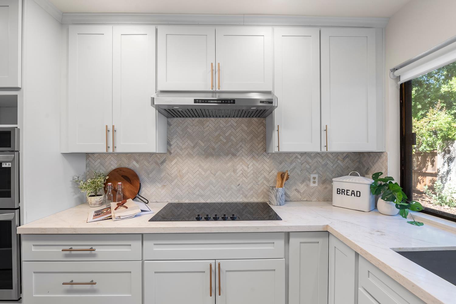 4121 Vista Way Davis, CA 95618 - Photo 10 of 32 a kitchen with a sink and cabinets