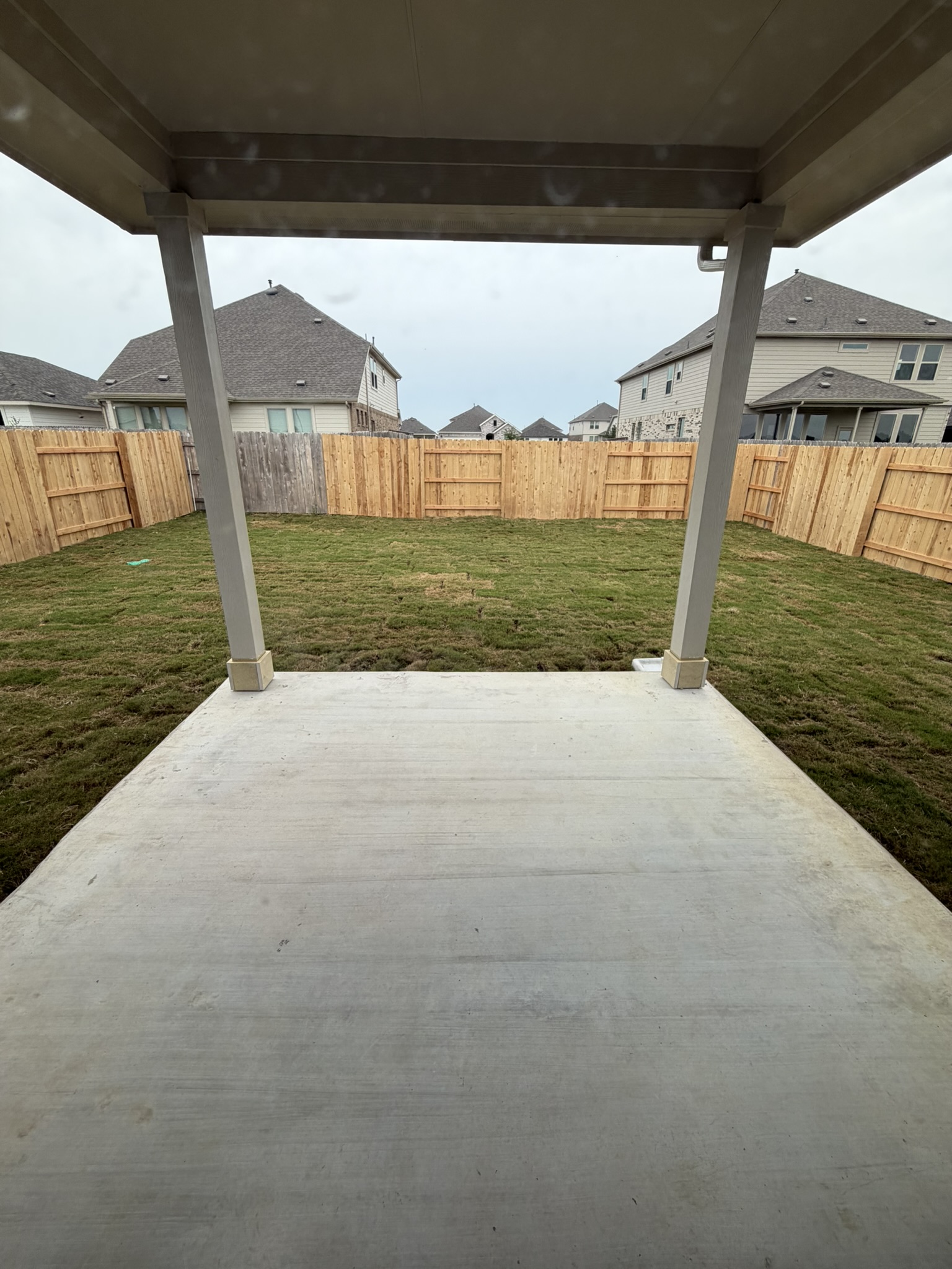 13717 Ryan Range Lane Elgin, TX 78621 - Photo 11 of 20 Rear Covered Patio & Private Backyard of Home