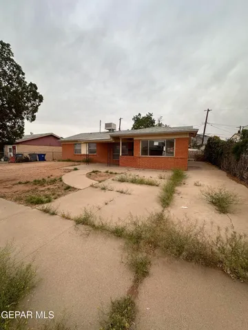 a view of residential houses with beach and ocean