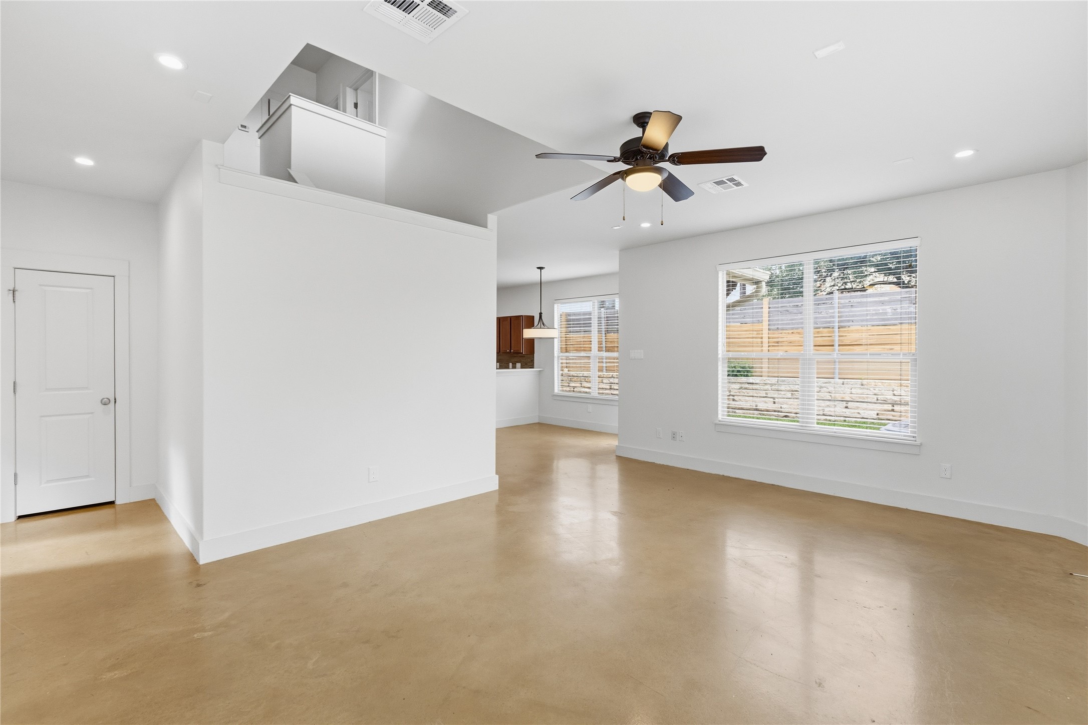 4124 Valley View Road, Unit 4A & 4B Austin, TX 78704 - Photo 40 of 40 An open floorplan with concrete flooring creates a contemporary and low-maintenance living space.