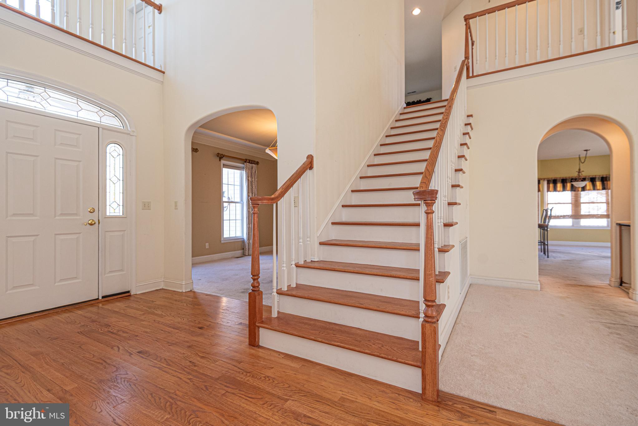 6023 Tarry Town Road Salisbury, MD 21801 - Photo 7 of 61 Inviting foyer with elegant staircase.