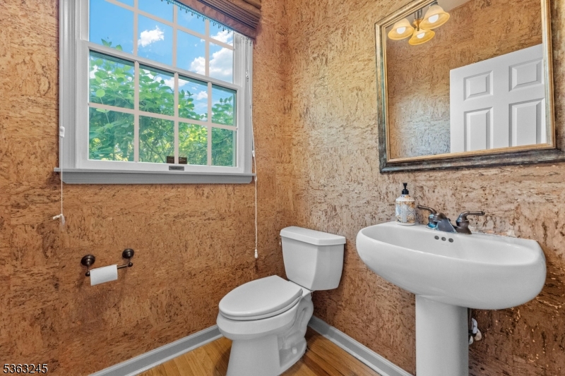 2 Seminole Road Skillman, NJ 08558 - Photo 11 of 50 a bathroom with a sink a toilet and mirror