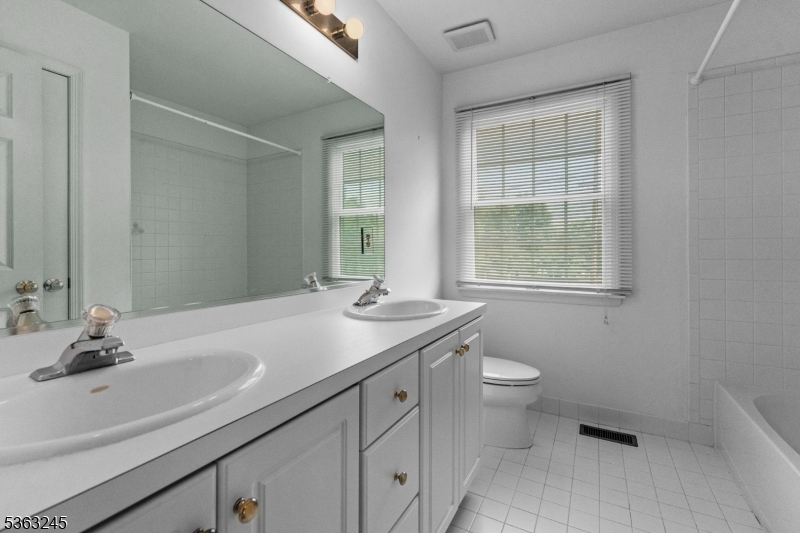 2 Seminole Road Skillman, NJ 08558 - Photo 27 of 50 a bathroom with a sink toilet and window