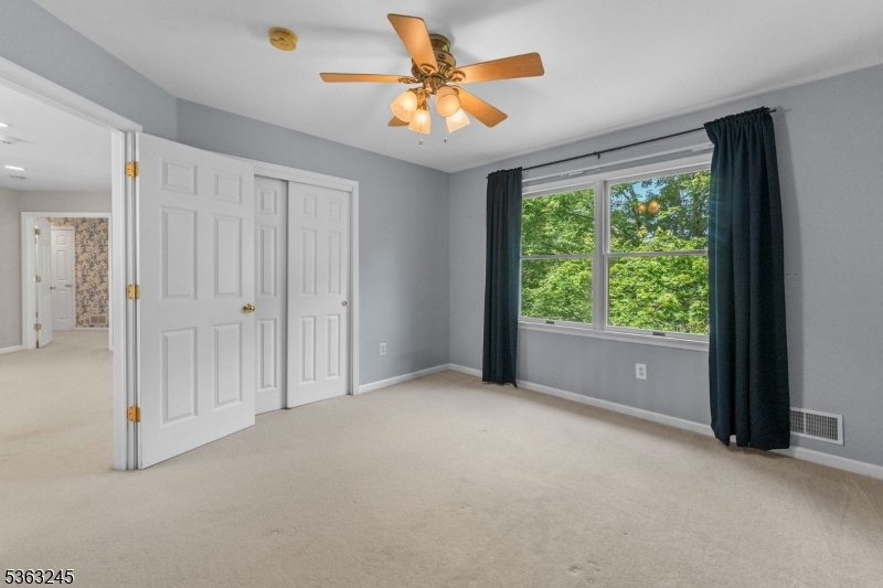 2 Seminole Road Skillman, NJ 08558 - Photo 30 of 50 a view of a room with a large window and a ceiling fan