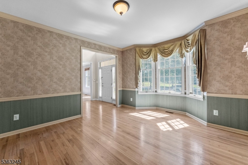 2 Seminole Road Skillman, NJ 08558 - Photo 9 of 50 a view of an empty room with window and hardwood floor