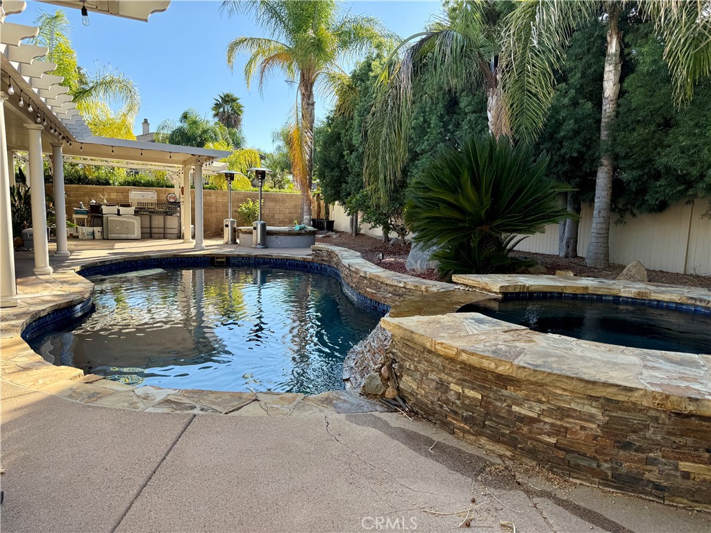 33467 Pitman Lane Menifee, CA 92584 - Photo 36 of 40 a swimming pool with outdoor seating and yard