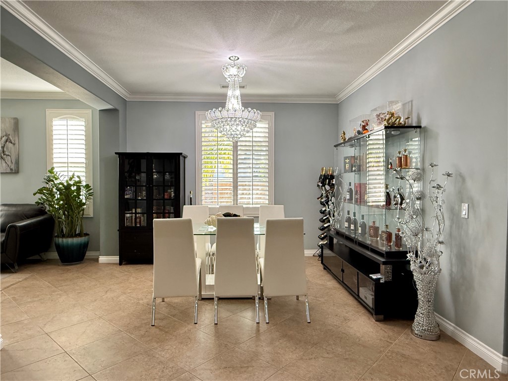 33467 Pitman Lane Menifee, CA 92584 - Photo 7 of 40 a living room with furniture and window