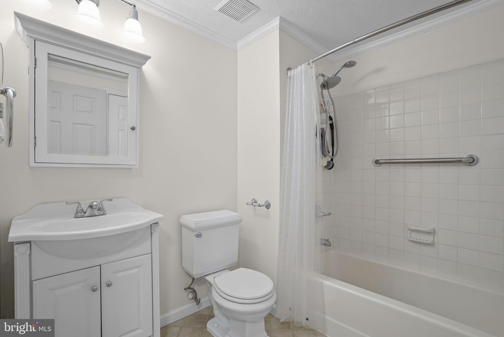 7129 Banjo Court Columbia, MD 21045 - Photo 12 of 46 a bathroom with a sink toilet and shower