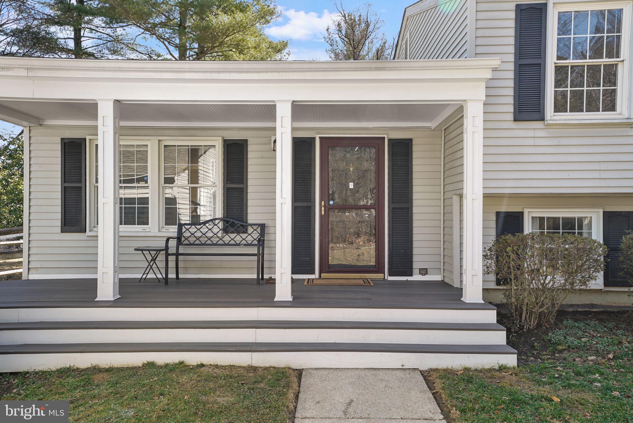 7129 Banjo Court Columbia, MD 21045 - Photo 2 of 46 a front view of a house with a porch