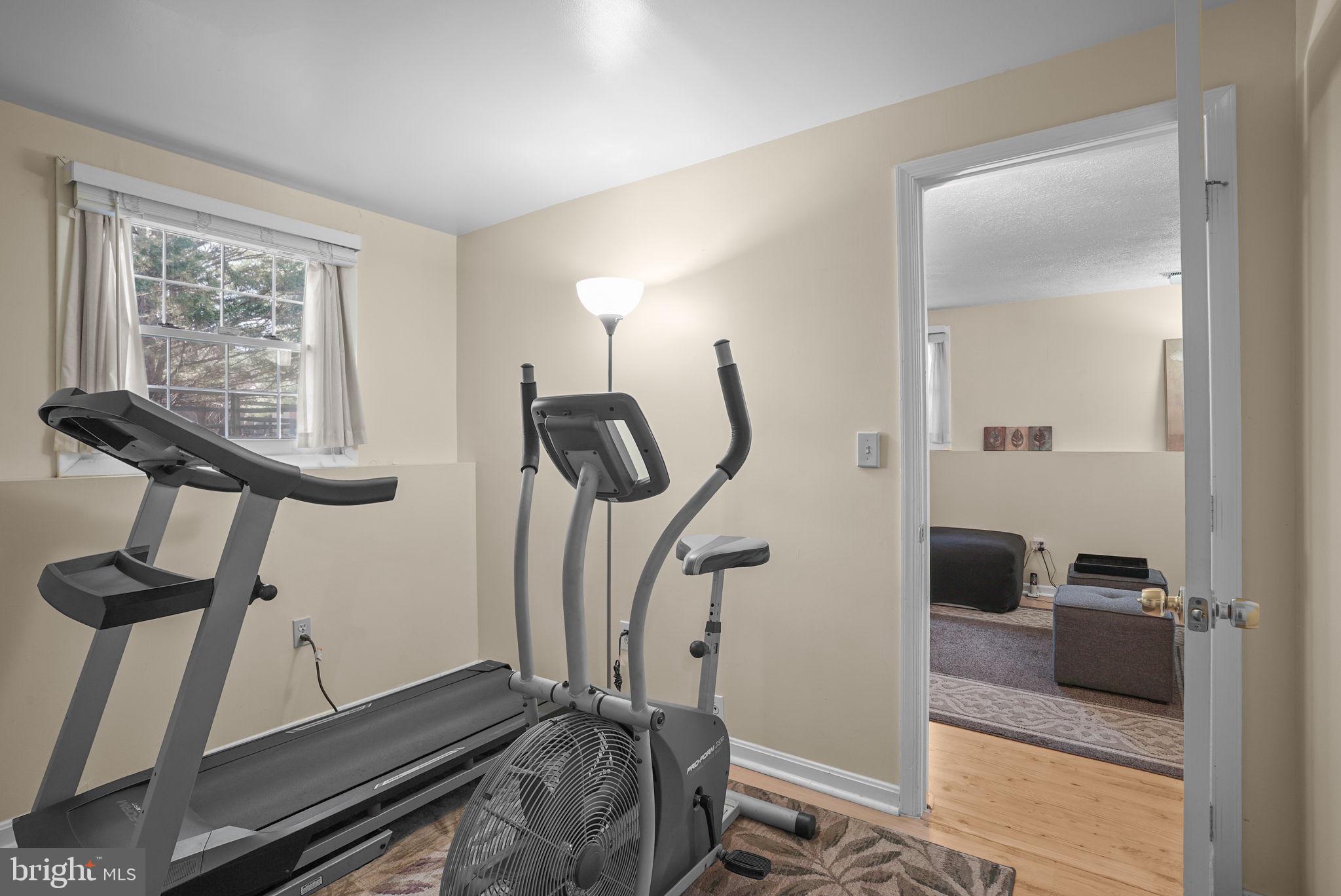 7129 Banjo Court Columbia, MD 21045 - Photo 22 of 46 a view of a room with gym equipment