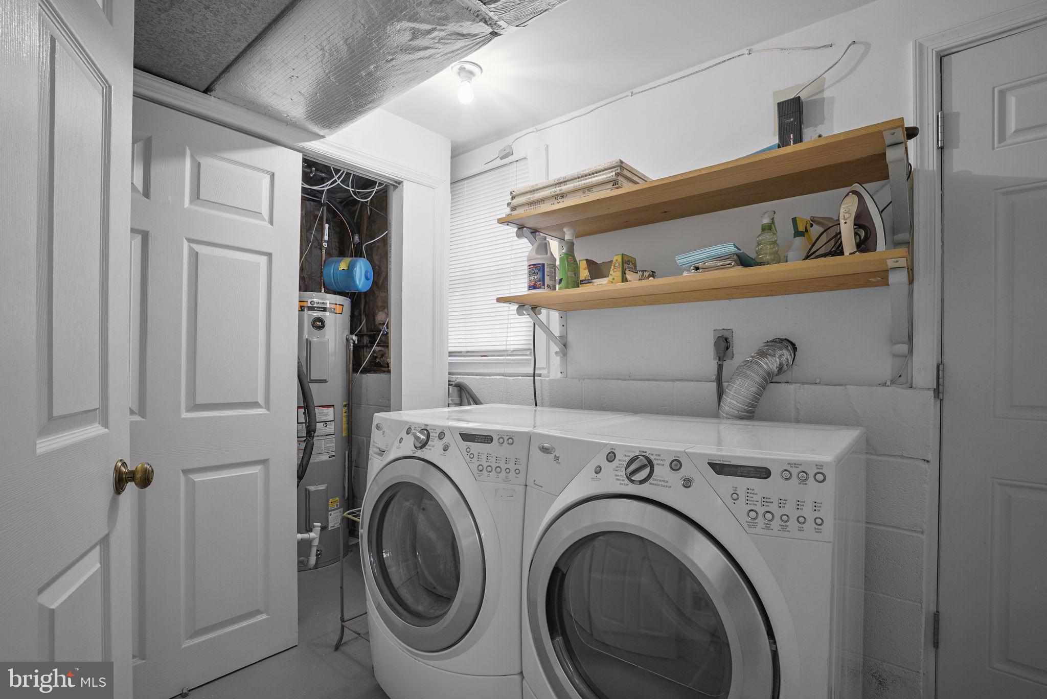 7129 Banjo Court Columbia, MD 21045 - Photo 23 of 46 a utility room with dryer and washer