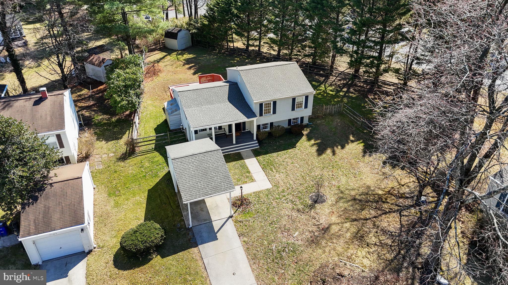 7129 Banjo Court Columbia, MD 21045 - Photo 34 of 46 an aerial view of residential house with outdoor space and trees all around