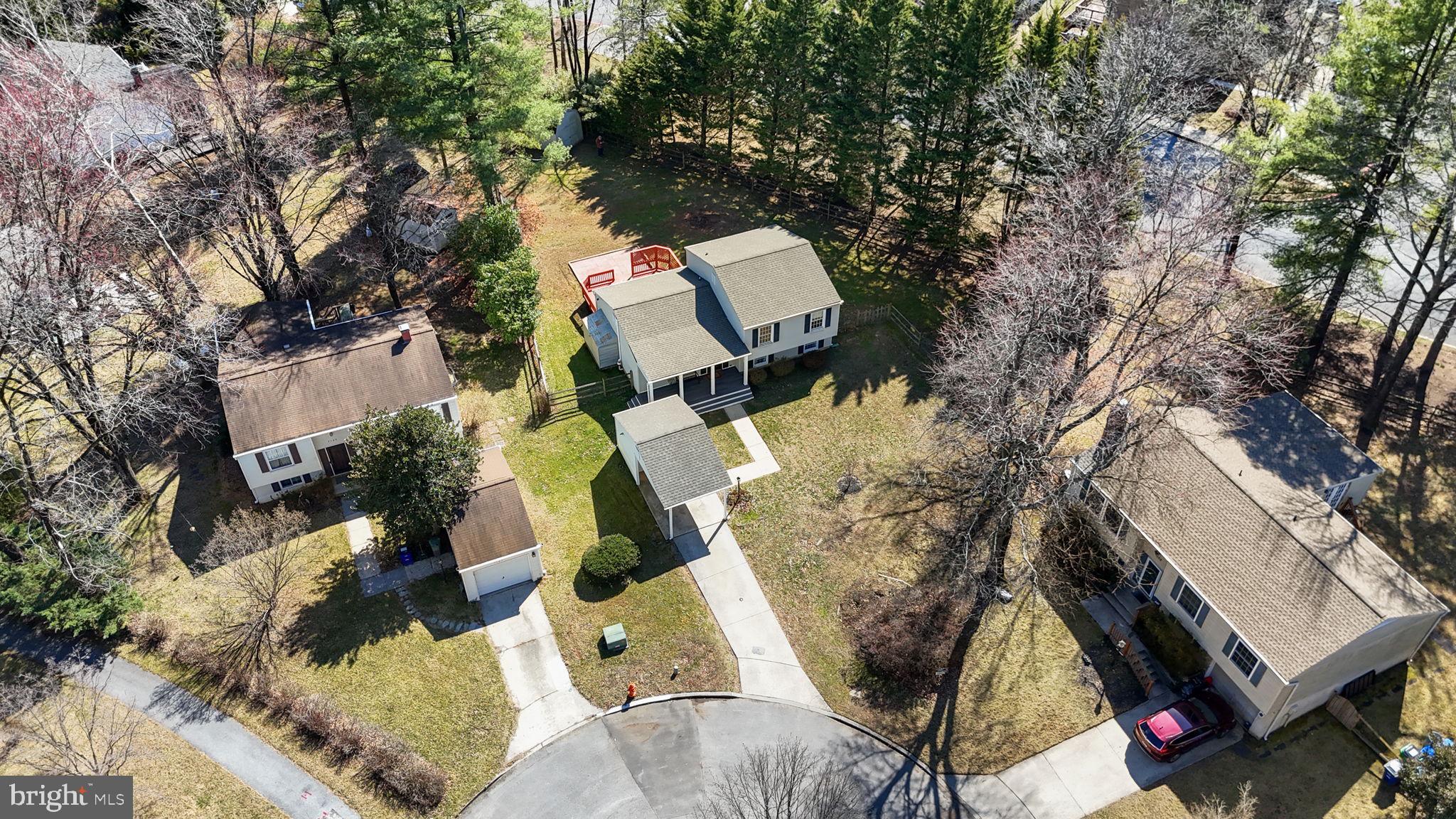 7129 Banjo Court Columbia, MD 21045 - Photo 39 of 46 an aerial view of residential house with outdoor space and parking
