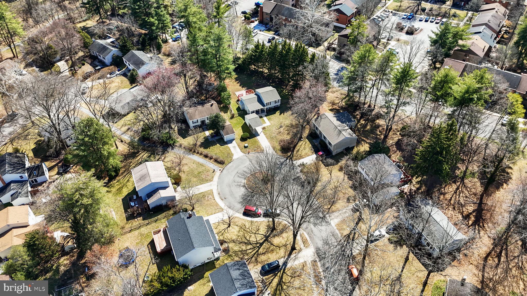 7129 Banjo Court Columbia, MD 21045 - Photo 40 of 46 an aerial view of a house with a yard and outdoor seating