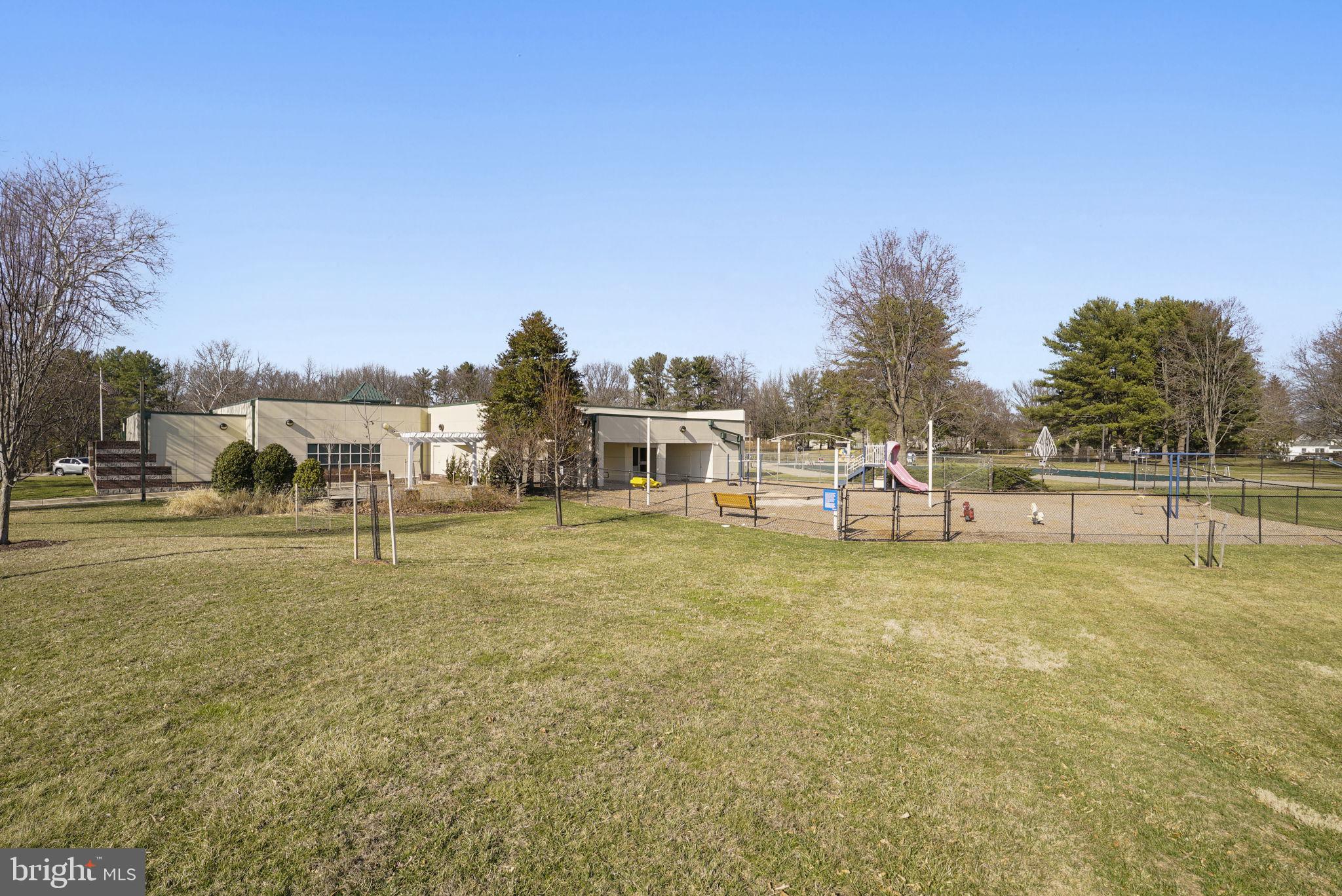 7129 Banjo Court Columbia, MD 21045 - Photo 43 of 46 a swimming pool with trees in the background